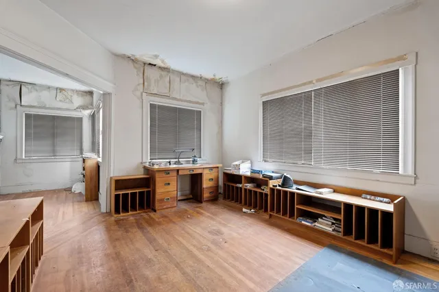 a bathroom with a sink a mirror and a bathtub