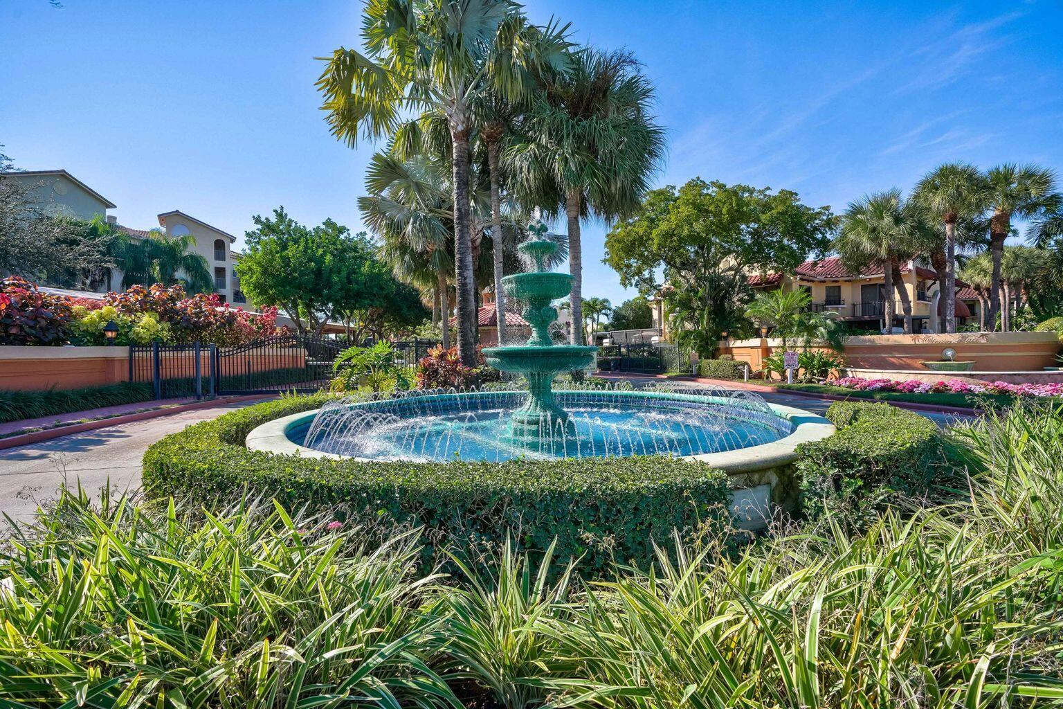 500 Uno Lago Drive, Unit 402 Juno Beach, FL 33408 - Photo 34 of 39 a view of an outdoor space