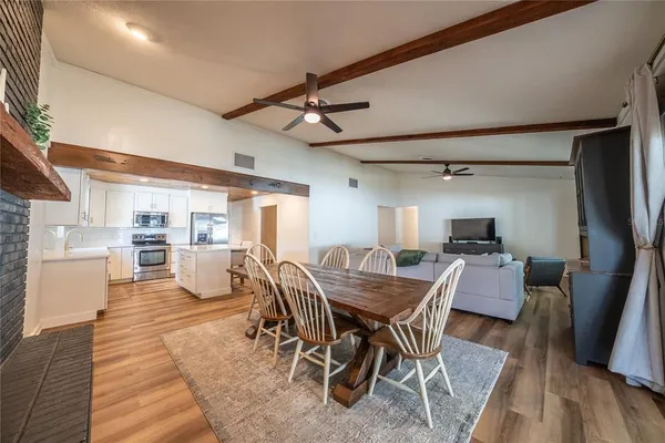 a view of a dining room with furniture