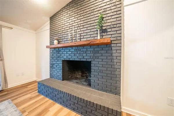 a view of a livingroom with a fireplace