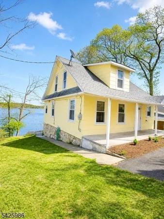 a view of a house with a swimming pool