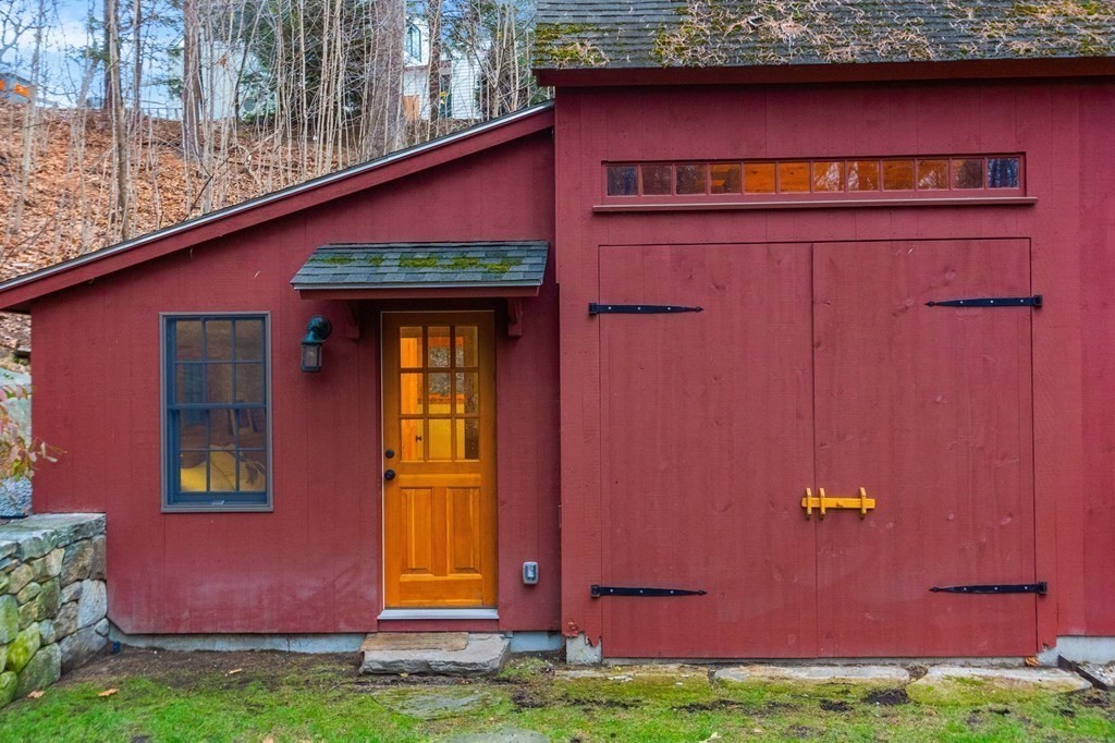 27 Windmill Hill Road Concord, MA 01742 - Photo 26 of 34 a view of a red door of the house