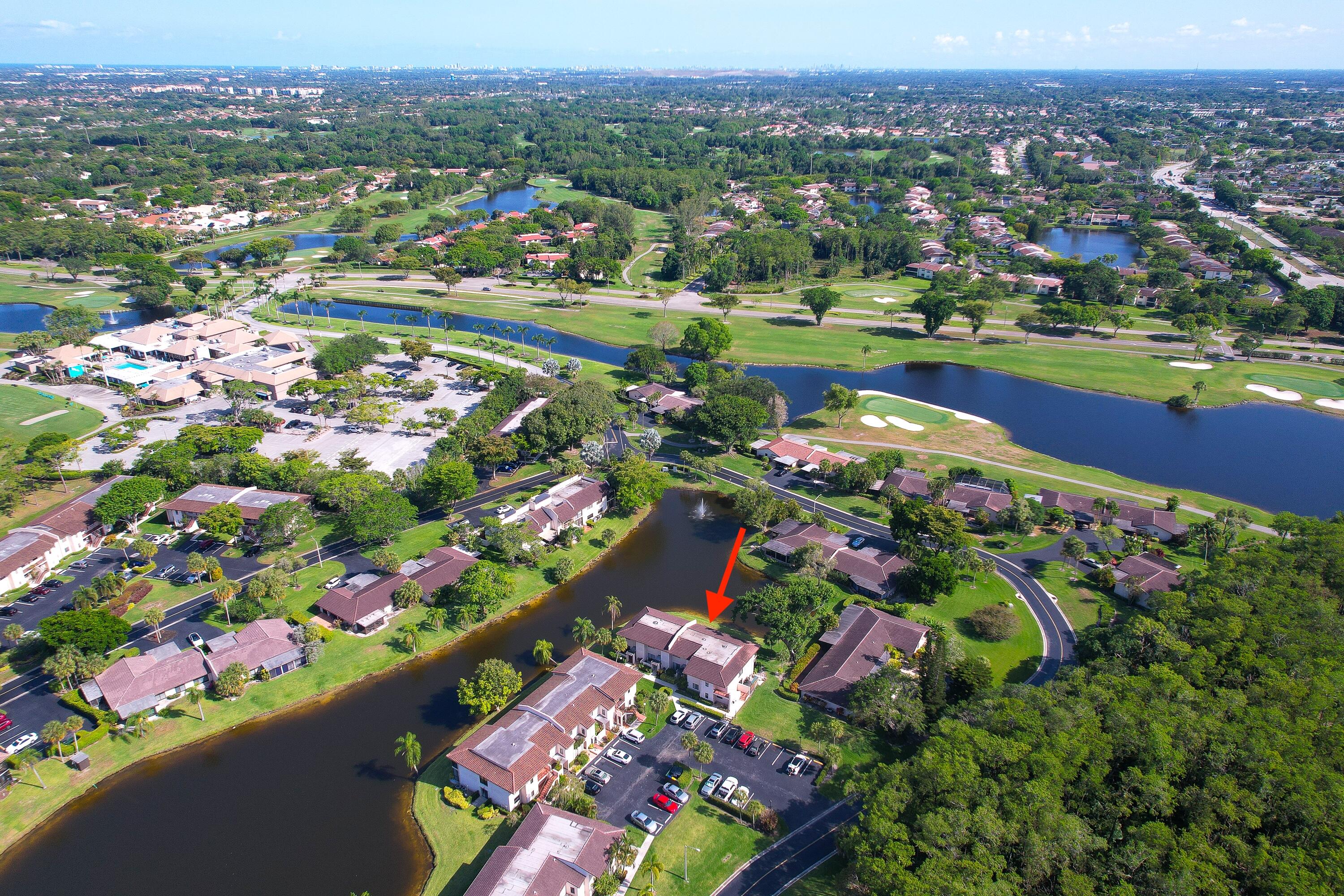 21160 Juego Circle, Unit 13C Boca Raton, FL 33433 - Photo 31 of 41 an aerial view of city and lake view