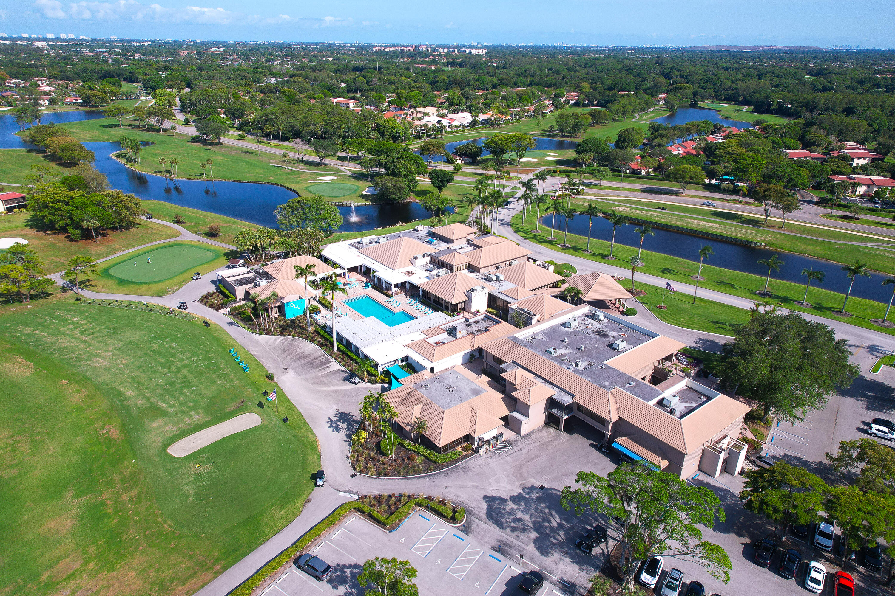 21160 Juego Circle, Unit 13C Boca Raton, FL 33433 - Photo 36 of 41 an aerial view of residential houses with outdoor space and river