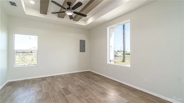 a view of an empty room and window