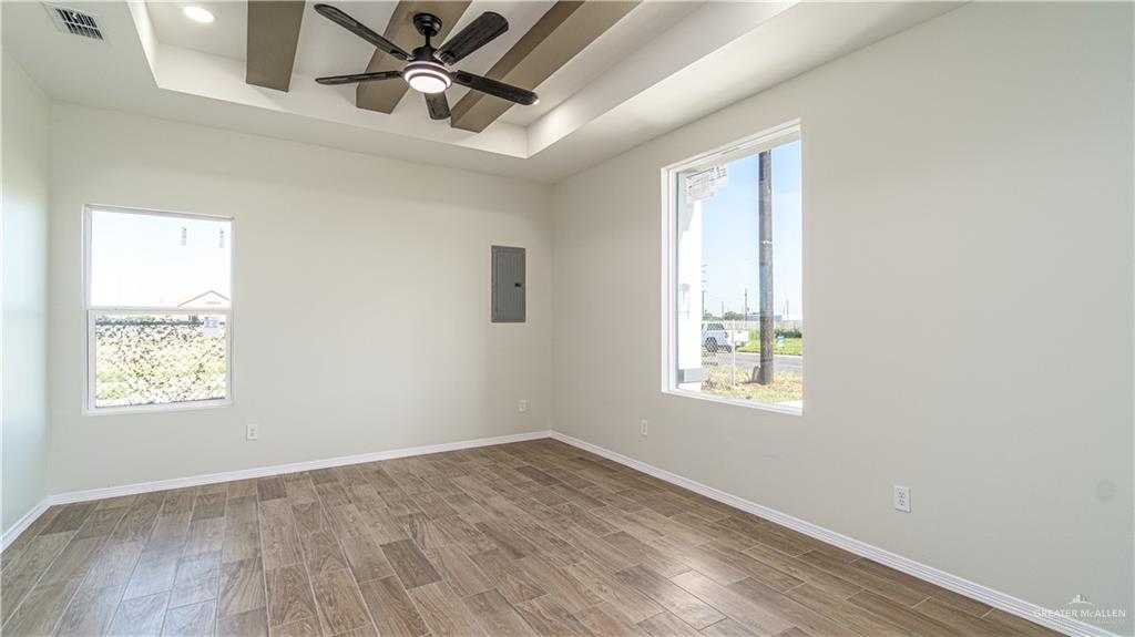 348 Merida Street Donna, TX 78537 - Photo 8 of 19 a view of an empty room and window