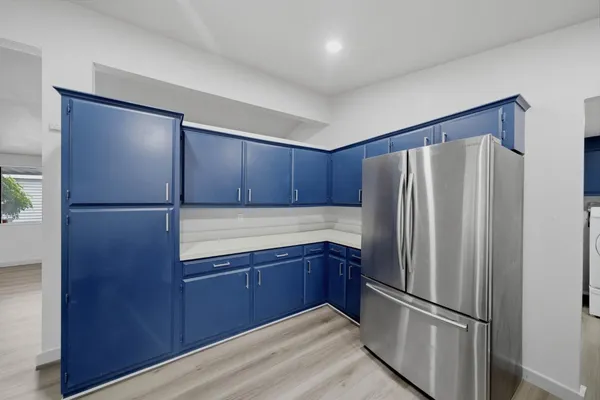 a kitchen with a stove and a microwave