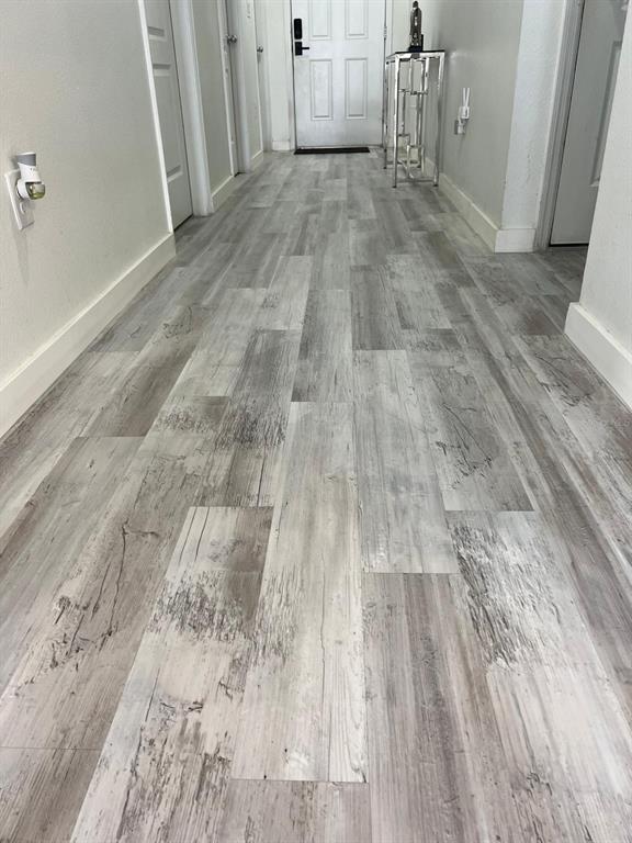 1404 Tawny Ridge Road Kissimmee, FL 34744 - Photo 11 of 21 a view of a room with wooden floor