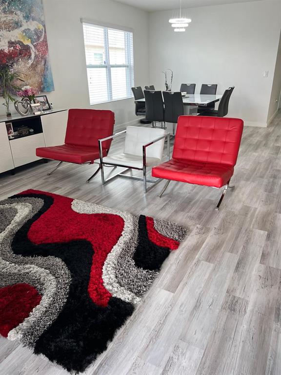1404 Tawny Ridge Road Kissimmee, FL 34744 - Photo 6 of 21 a living room with furniture and a couch