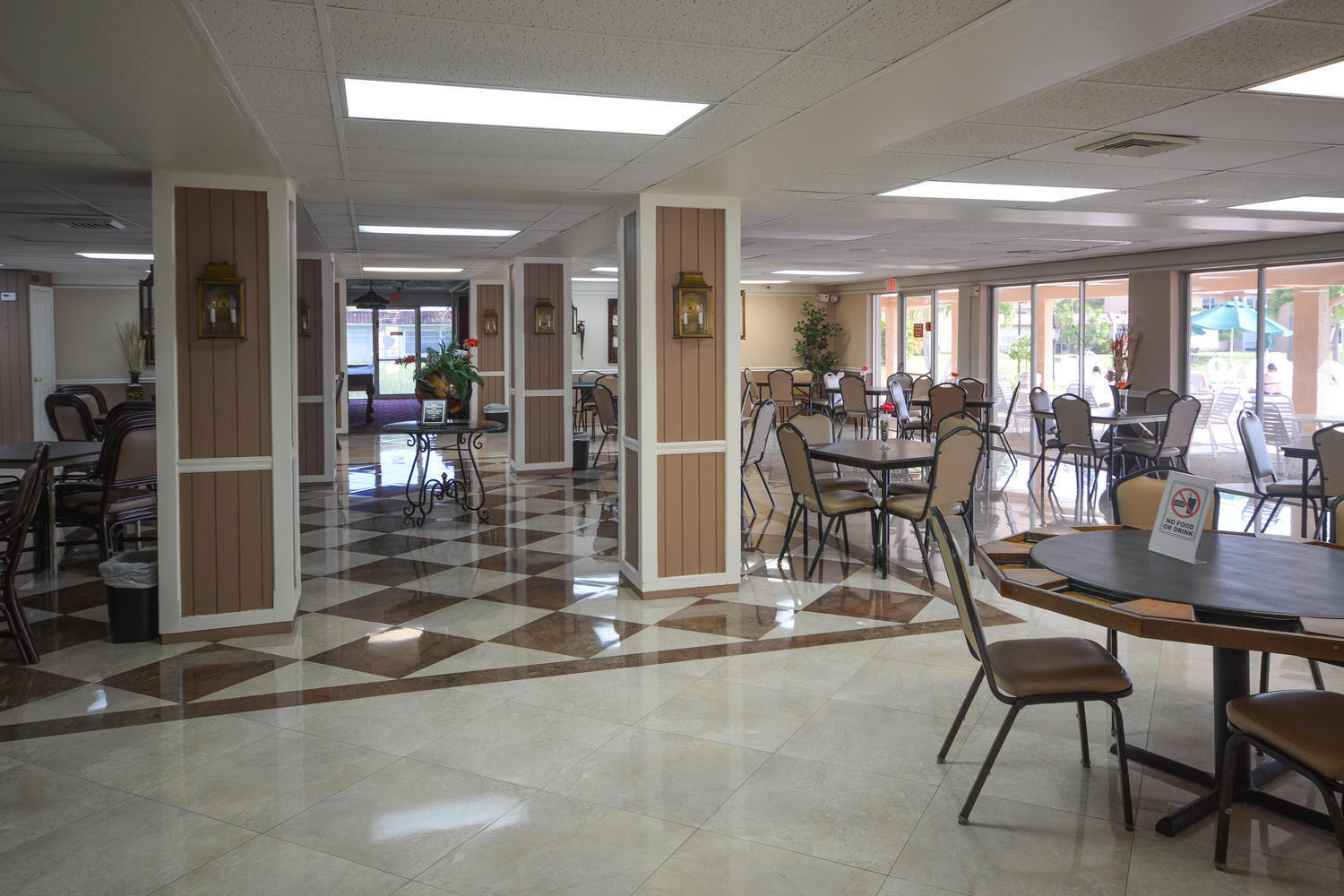 477 Lake Dora Drive West Palm Beach, FL 33411 - Photo 2 of 28 a view of a dining room with furniture and chandelier
