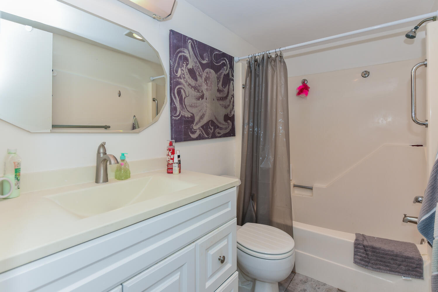 477 Lake Dora Drive West Palm Beach, FL 33411 - Photo 22 of 28 a bathroom with a sink a toilet and a shower curtain