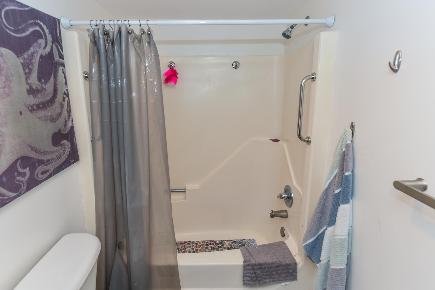 477 Lake Dora Drive West Palm Beach, FL 33411 - Photo 23 of 28 a bathroom with a shower curtain and a sink