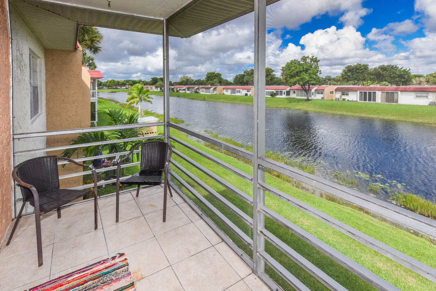 477 Lake Dora Drive West Palm Beach, FL 33411 - Photo 25 of 28 a view of swimming pool from a balcony