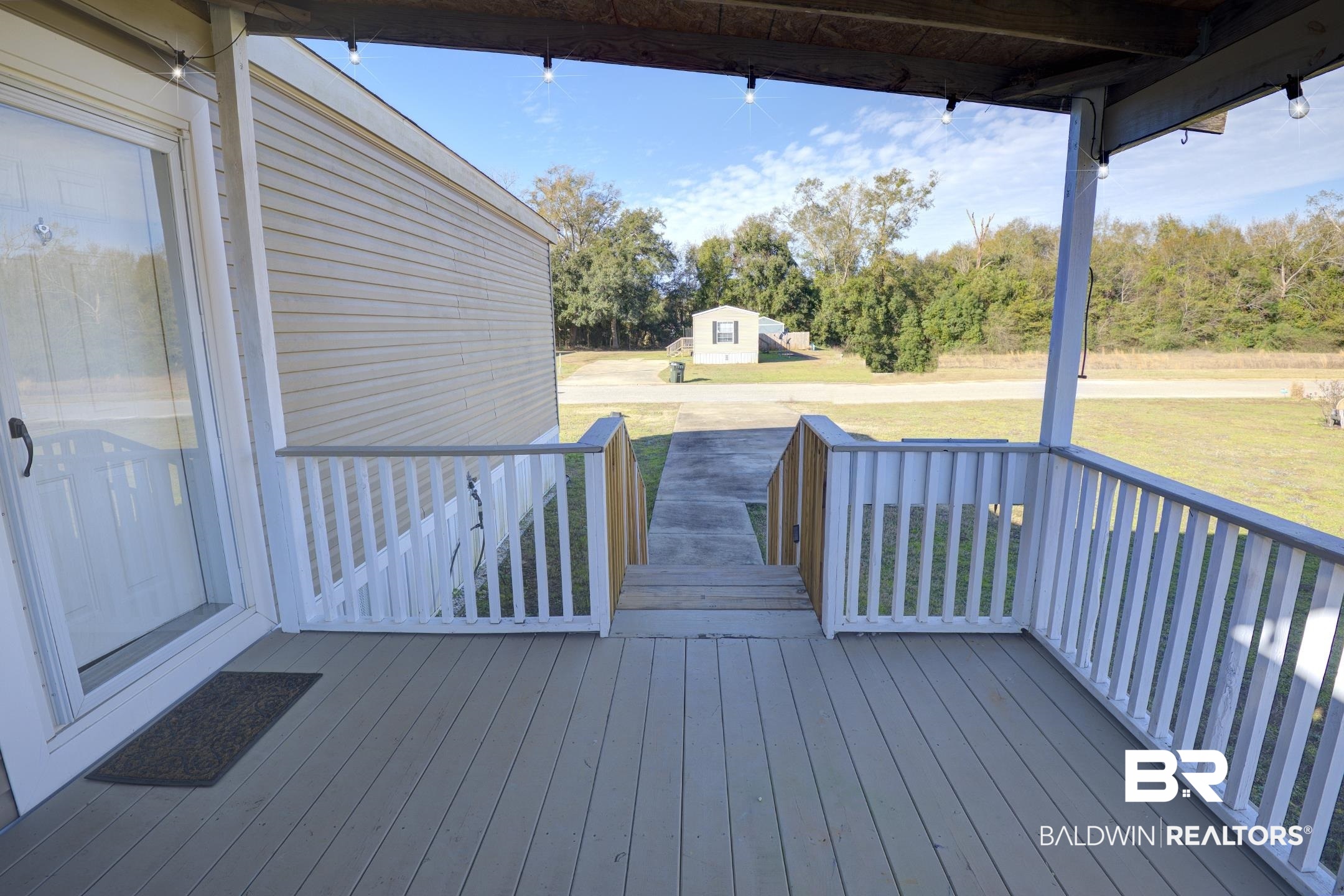 21859 West Side Loop Silverhill, AL 36576 - Photo 6 of 24 Wooden terrace featuring a yard