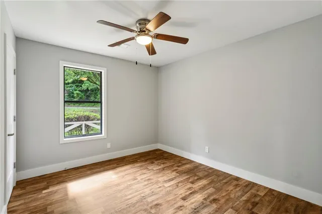 a bathroom with a sink toilet and mirror