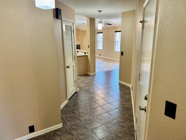 view of a bathroom with a glass door shower