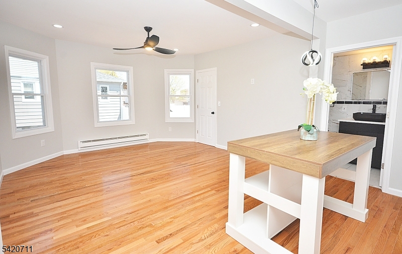 1324 George Street Plainfield, NJ 07062 - Photo 15 of 26 a view of a dining room with a table and chairs
