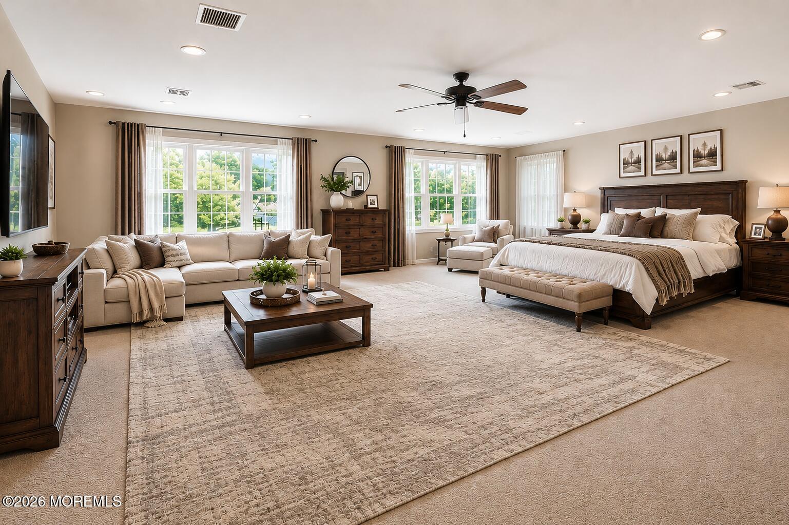 22 Ethan Allen Road Freehold, NJ 07728 - Photo 29 of 31 a spacious bedroom with a bed couch and windows
