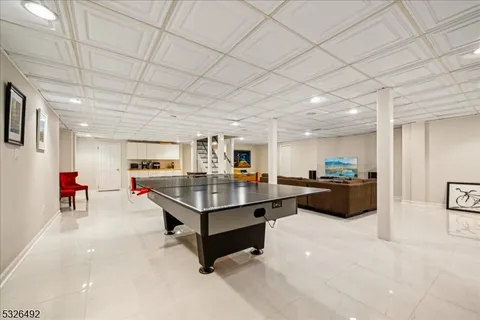 a living room with furniture and a table