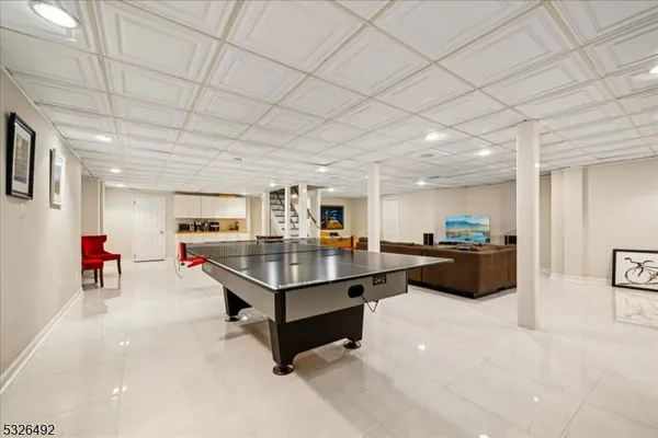 a living room with furniture and a table