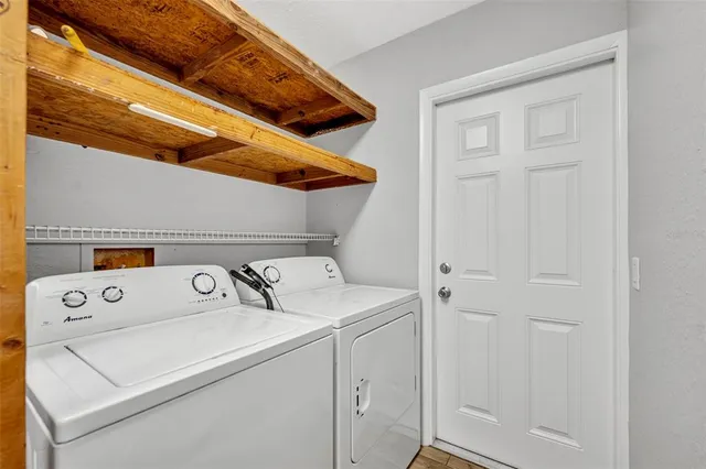 a utility room with dryer and washer