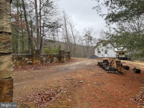 183 Wilson Road Capon Bridge, WV 26711 - Photo 3 of 10 a view of a park with large trees