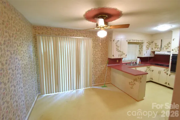 a bathroom with a bathtub and a sink