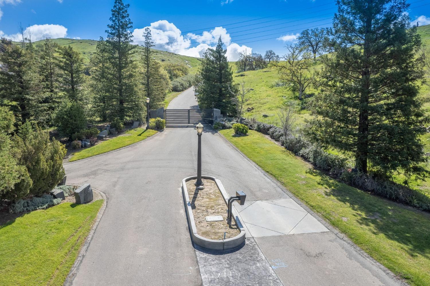 1 Summit Mountain Road Clovis, CA 93619 - Photo 11 of 13 a view of a swimming pool with a yard