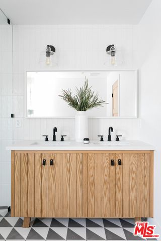 a view of cabinet with wooden floor