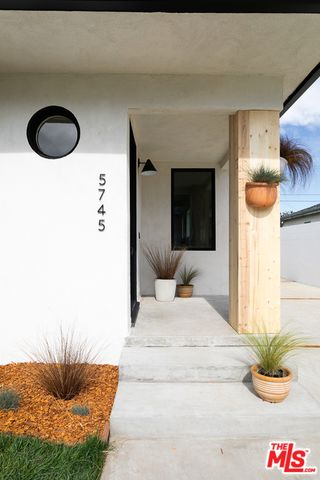 a bedroom with a bed and a cabinets