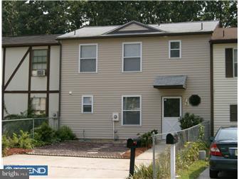 134 Hampshire Road Sicklerville, NJ 08081 - Photo 1 of 12 a front view of a house with garden