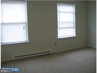 134 Hampshire Road Sicklerville, NJ 08081 - Photo 4 of 12 an empty room with a window