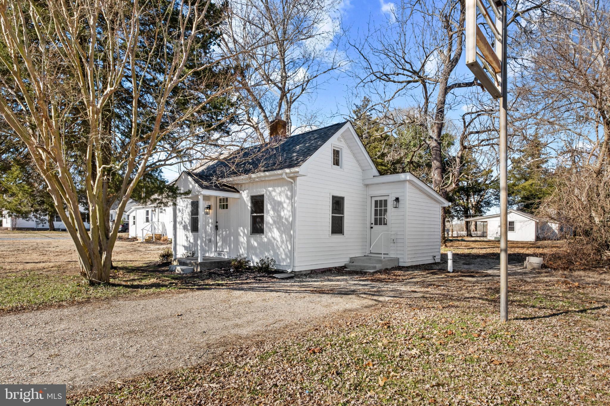 Charming cottage with inviting curb appeal.