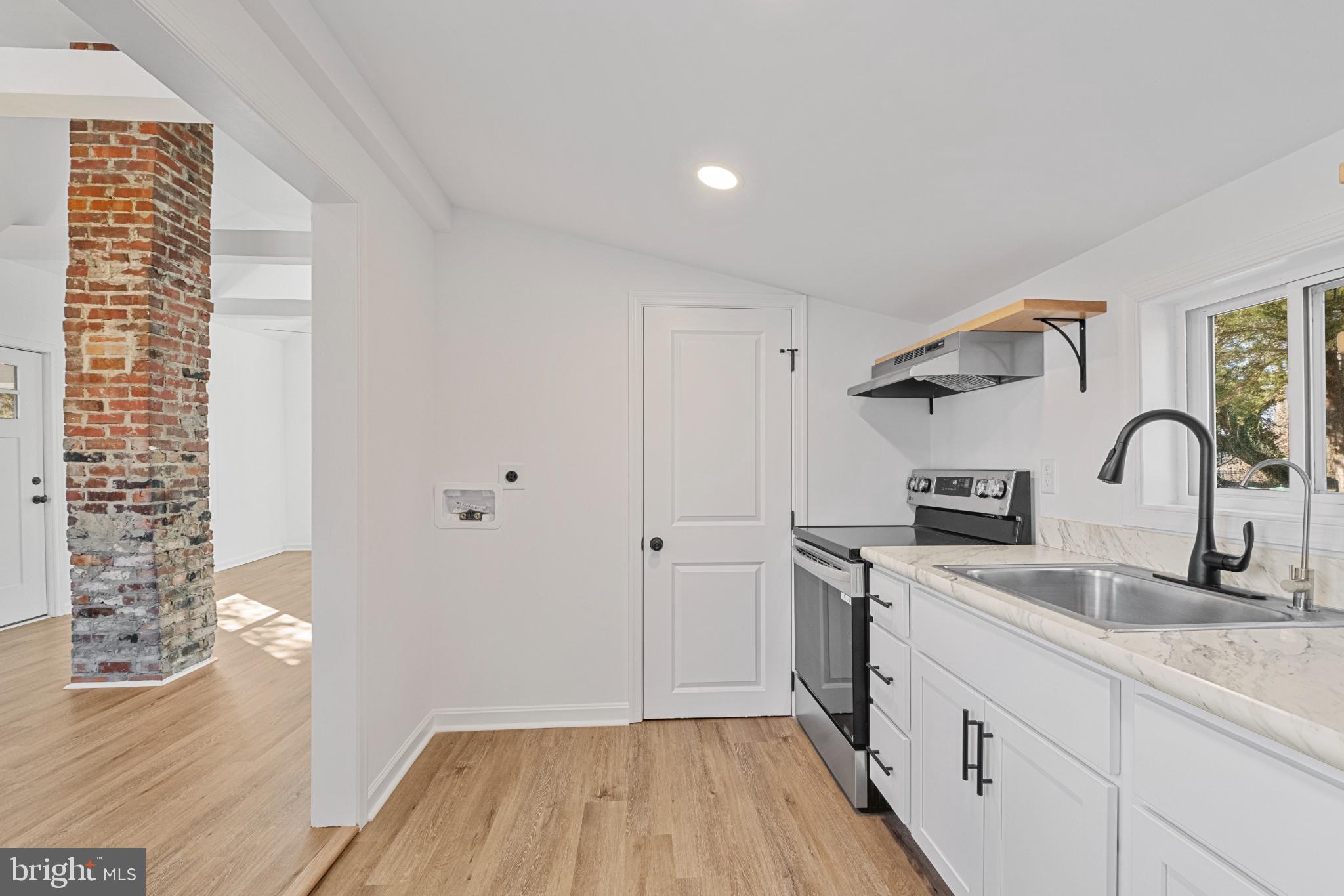 28276 Riverside Drive Salisbury, MD 21801 - Photo 15 of 24 Modern kitchen with rustic charm.