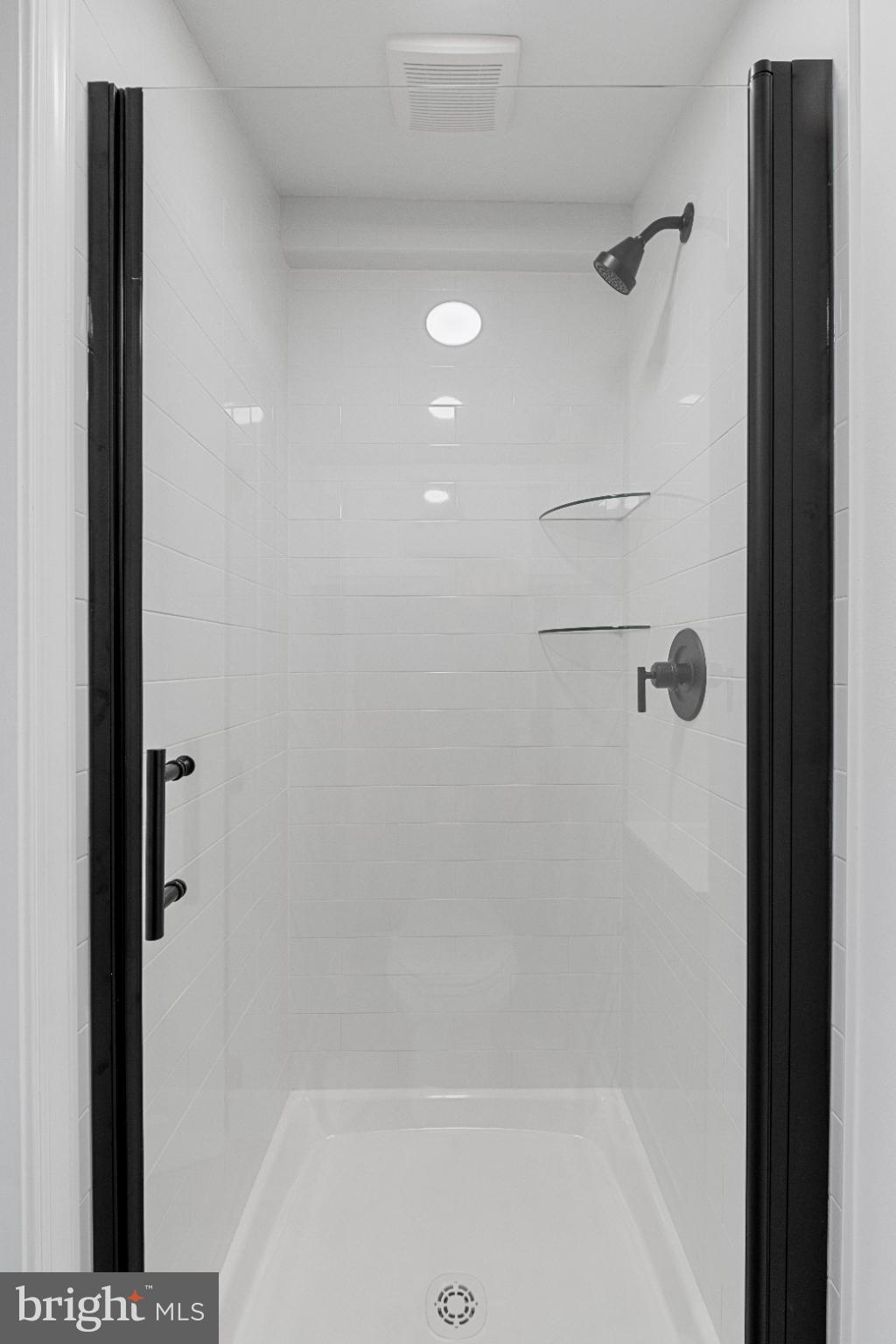 28276 Riverside Drive Salisbury, MD 21801 - Photo 23 of 24 Sleek modern shower with elegant finishes.