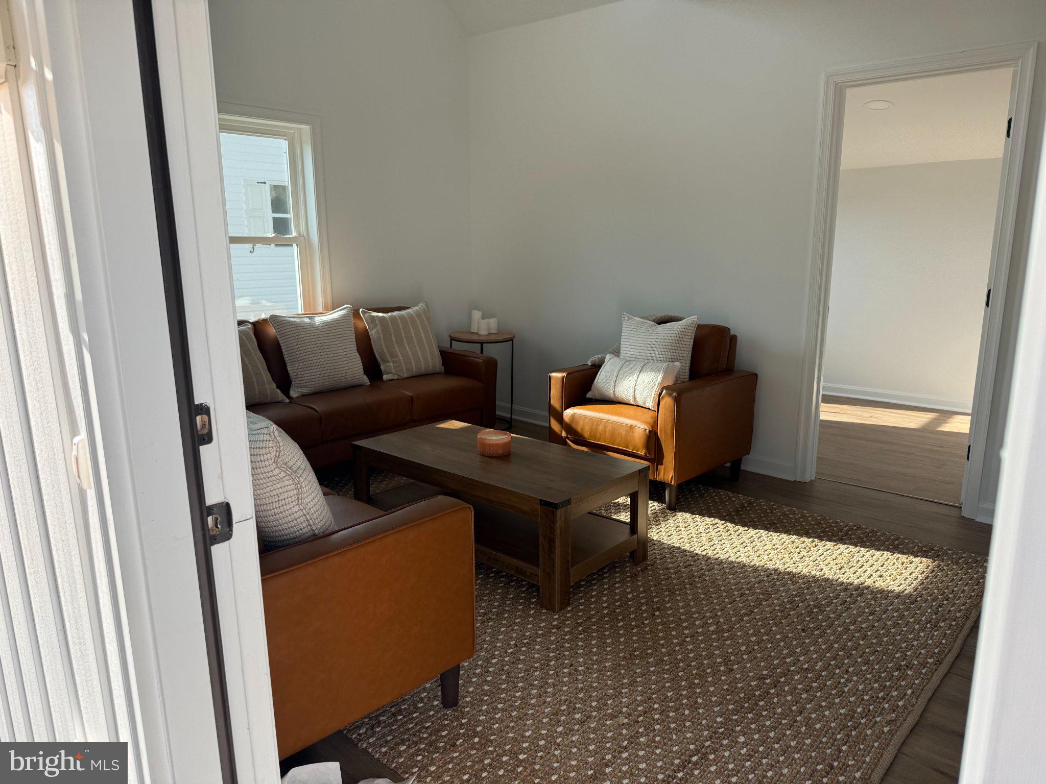 28276 Riverside Drive Salisbury, MD 21801 - Photo 25 of 30 a living room with furniture and a window