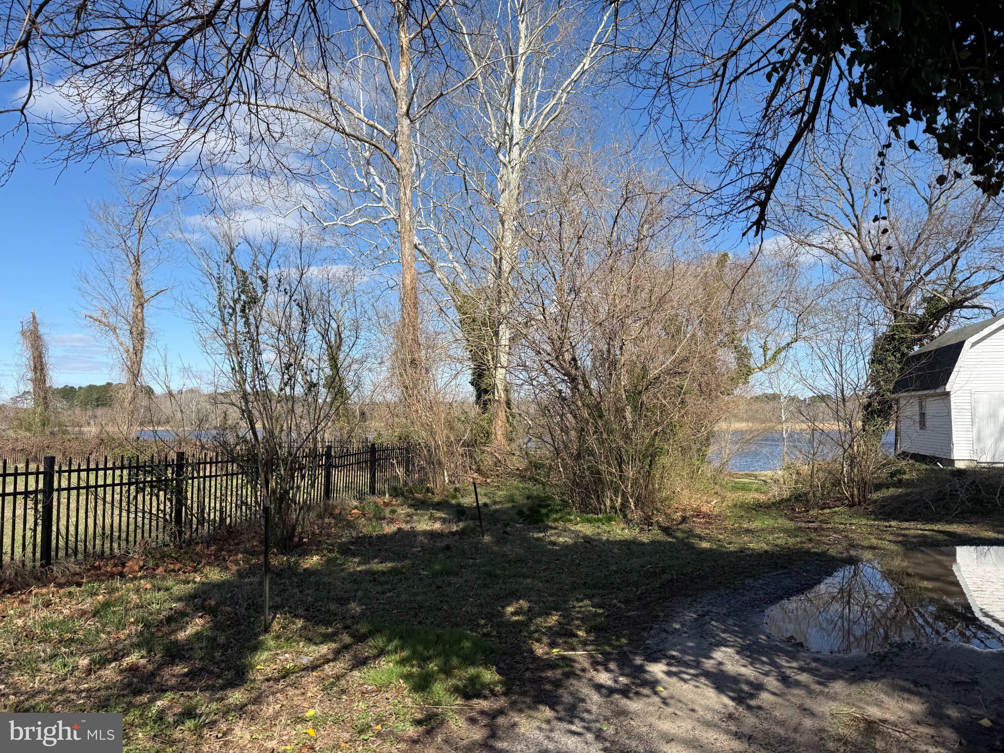 28276 Riverside Drive Salisbury, MD 21801 - Photo 28 of 30 a view of a yard covered with snow