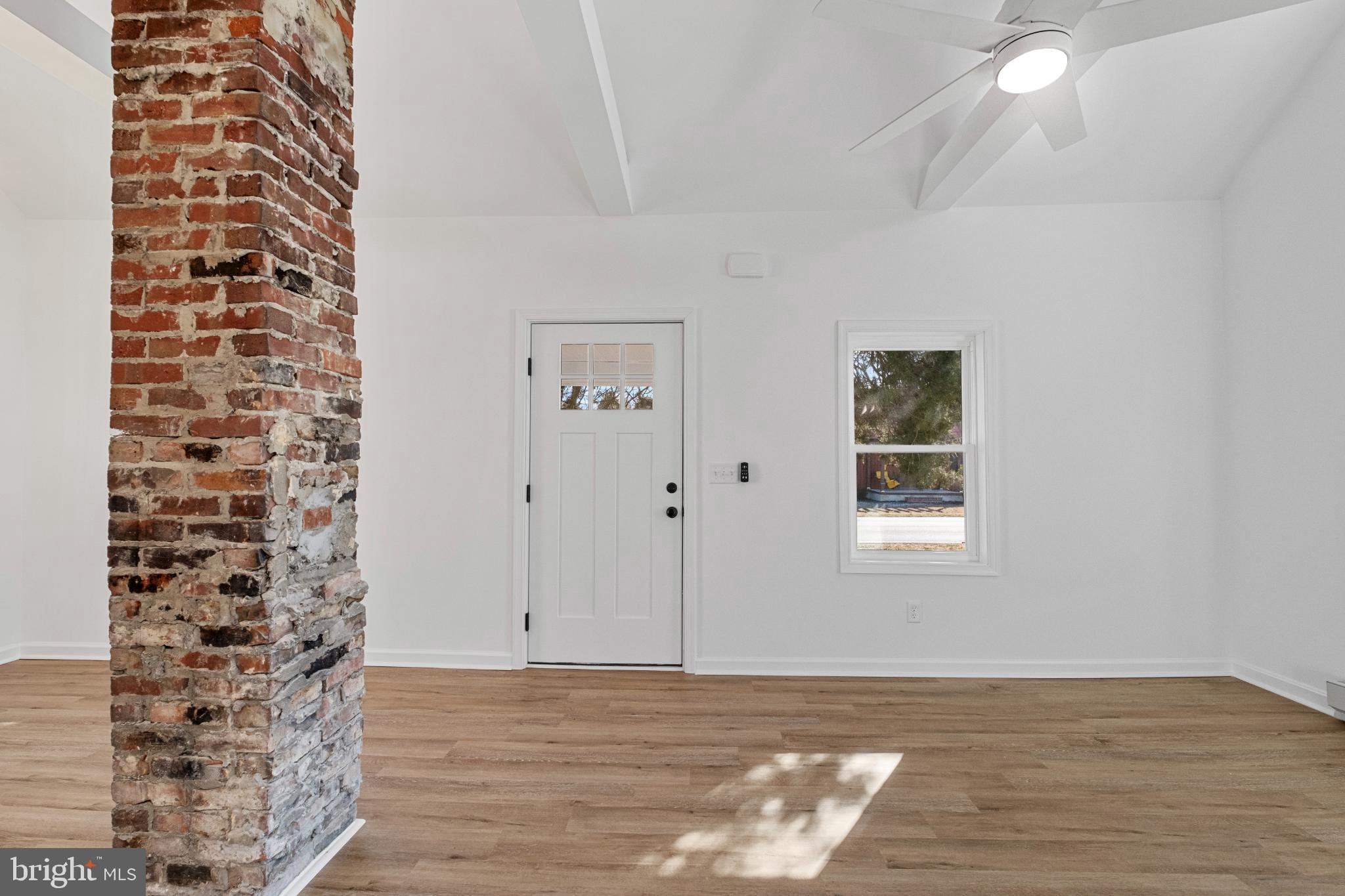 28276 Riverside Drive Salisbury, MD 21801 - Photo 7 of 24 Charming space with rustic brick accents.