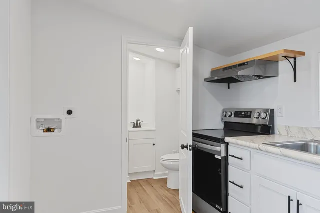 a view of a bathroom with a sink and a toilet