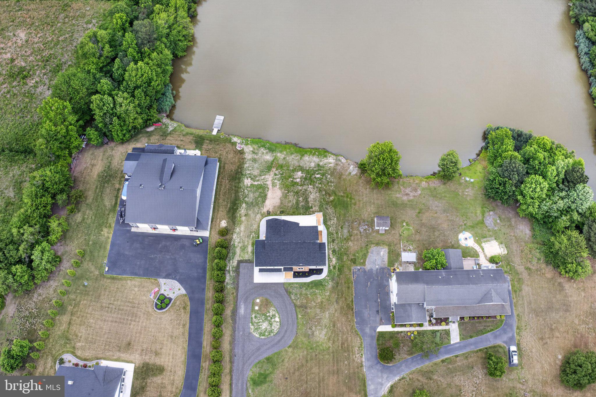 34029 Peppers Corner Road Millville, DE 19967 - Photo 91 of 101 Lakeside homes nestled in greenery.