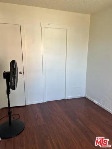 a view of kitchen with wooden floor