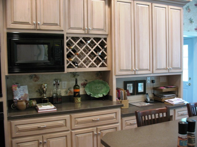 12142 Mandarin Road Jacksonville, FL 32223 - Photo 20 of 50 a kitchen with a stove and cabinets