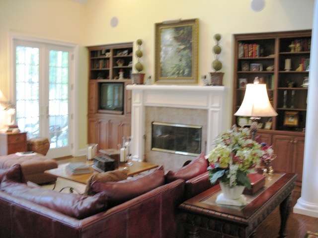 12142 Mandarin Road Jacksonville, FL 32223 - Photo 25 of 50 a living room with furniture and a fireplace