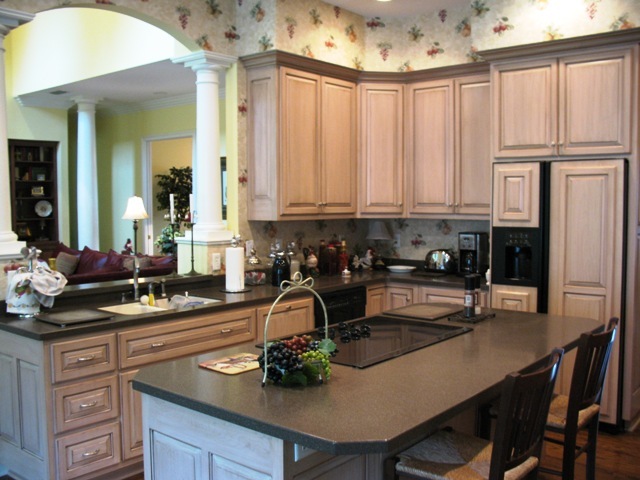 12142 Mandarin Road Jacksonville, FL 32223 - Photo 3 of 50 a kitchen with a sink a stove and chairs