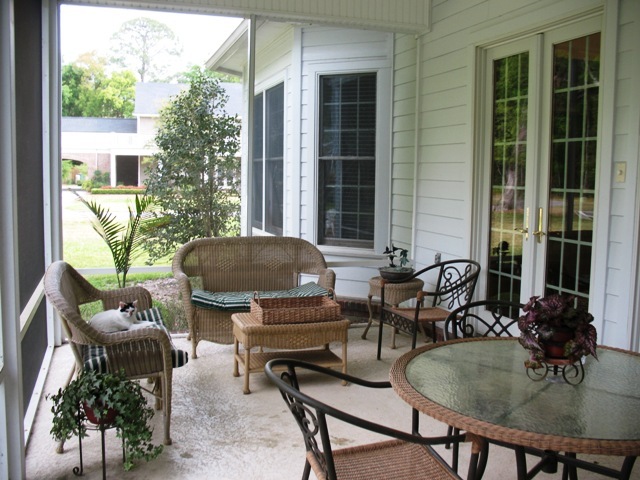 12142 Mandarin Road Jacksonville, FL 32223 - Photo 41 of 50 a outdoor dining space with furniture and potted plants