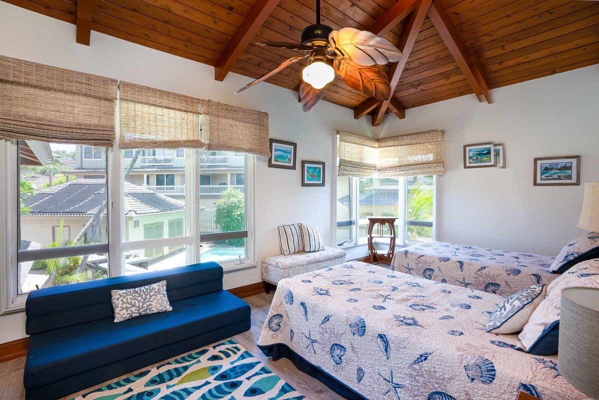 1871 Pe'e Road, Unit 2 Koloa, HI 96756 - Photo 14 of 25 a bedroom with a bed couch and window