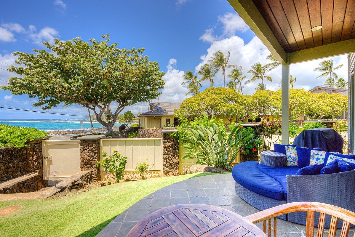 1871 Pe'e Road, Unit 2 Koloa, HI 96756 - Photo 21 of 25 a view of a chairs and table in the patio