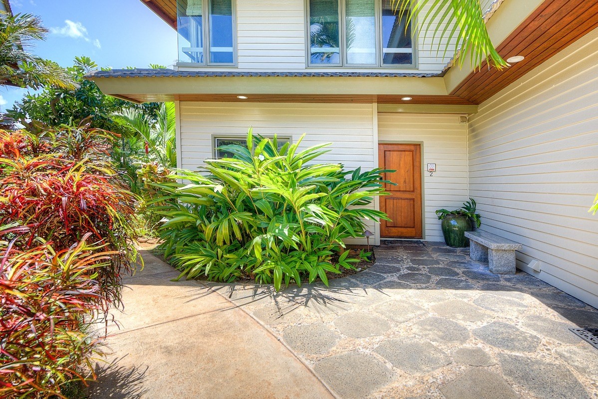 1871 Pe'e Road, Unit 2 Koloa, HI 96756 - Photo 22 of 25 a view of a backyard with plants