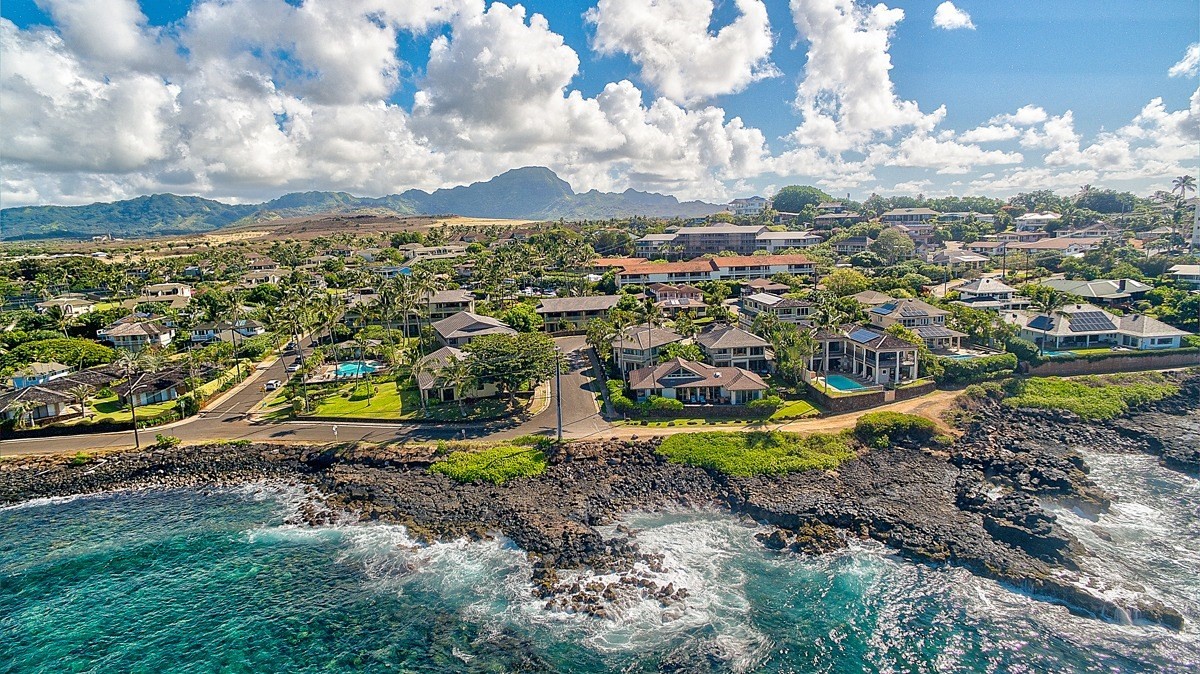 1871 Pe'e Road, Unit 2 Koloa, HI 96756 - Photo 23 of 25 a view of a yard with swimming pool and outdoor seating