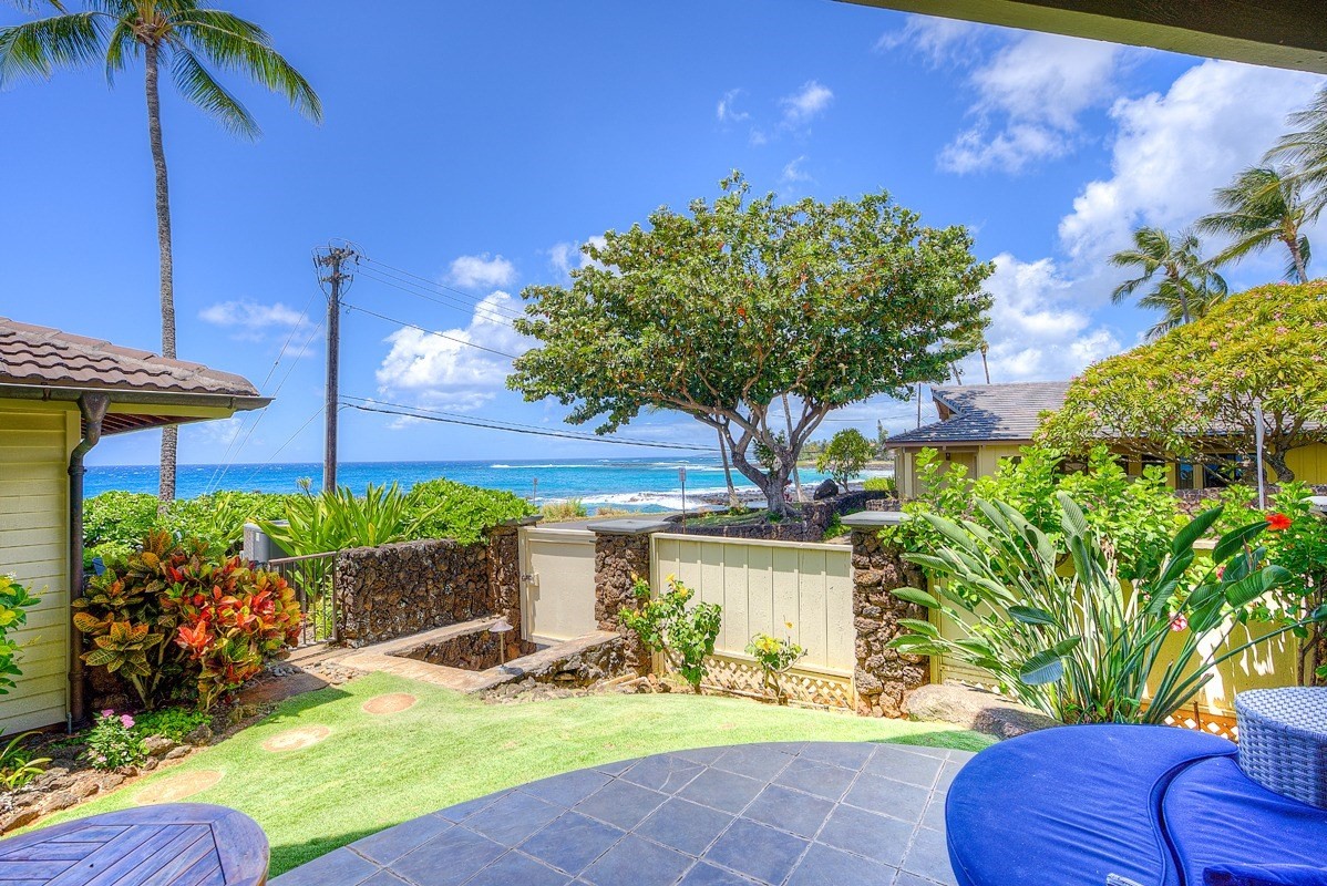 1871 Pe'e Road, Unit 2 Koloa, HI 96756 - Photo 3 of 25 a view of a backyard with plants